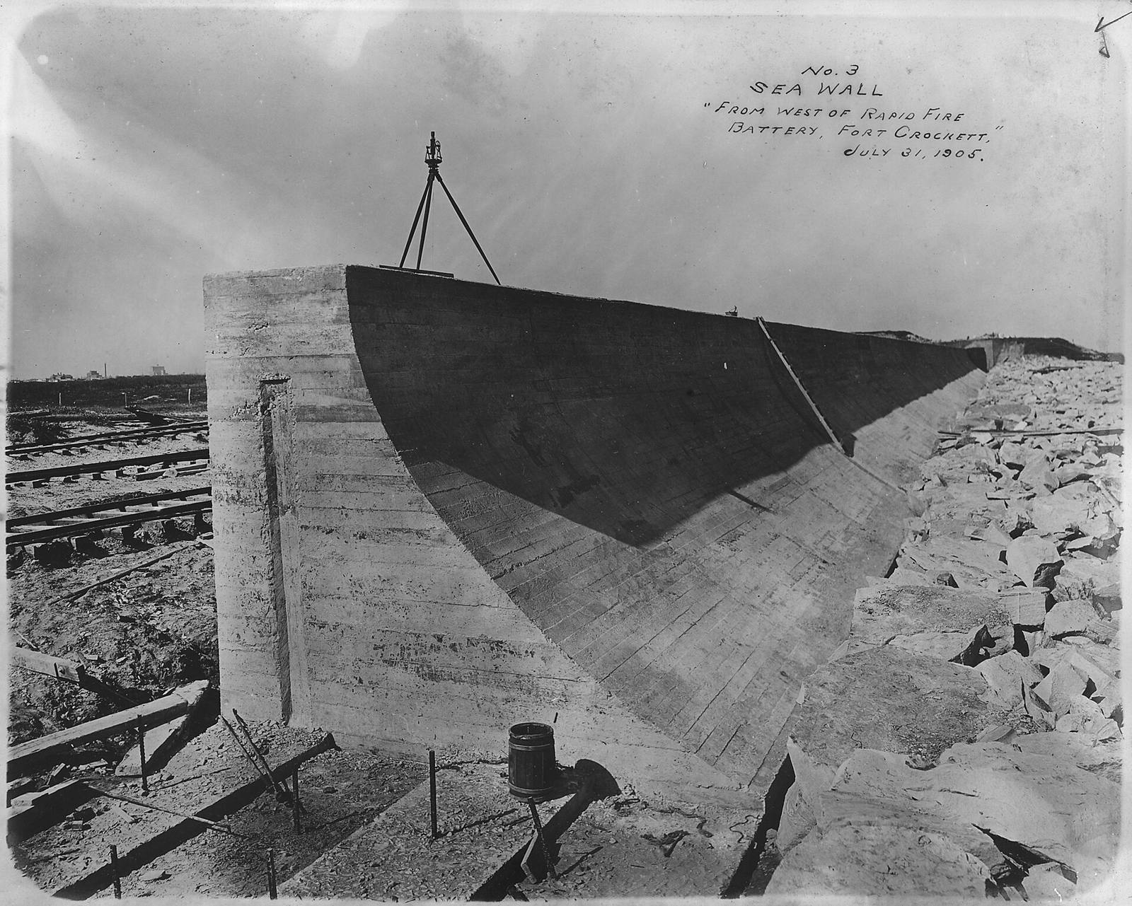 The curved face of the new Seawall west of Fort Crockett, photographed on 31 July 1905